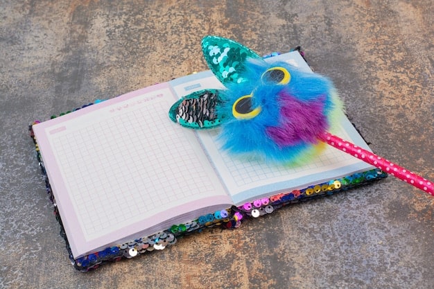 Close-up shot of a beautifully decorated journal with colorful pens and spiritual symbols (e.g., crystals, feathers) surrounding it. The journal is open to a page with thoughtful handwritten notes.