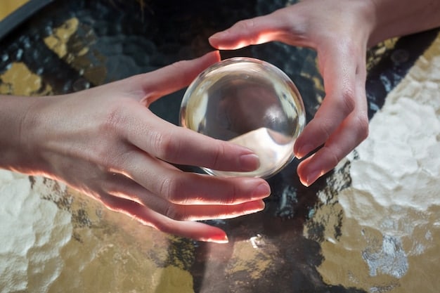 A close-up of hands holding a crystal ball, softly illuminated, symbolizing clarity and the search for inner guidance and intuitive insights.