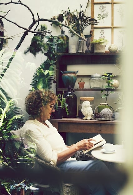 A person reading a book in a cozy, well-lit room, surrounded by plants, symbolizing mental stimulation and relaxation.