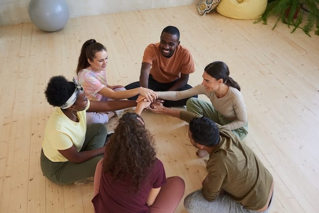 An image of a diverse group of people sitting together in a circle, smiling and holding hands, representing the interconnectedness and compassion fostered by loving-kindness meditation.