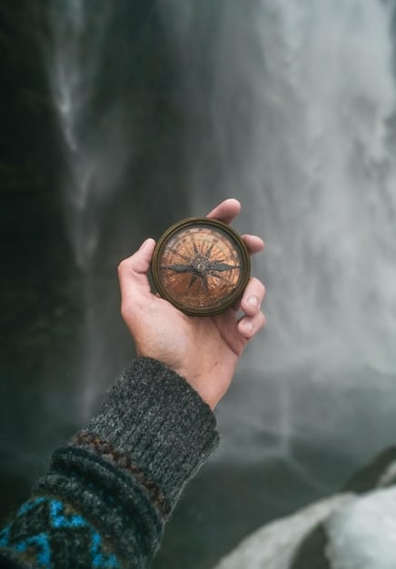 A close-up of hands holding a compass, symbolizing the navigation through spiritual uncertainty and the search for direction.