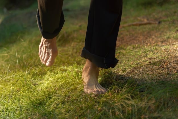 A close-up shot of feet walking on a grassy path, emphasizing the connection between the body and the earth during walking meditation, with soft focus on the surrounding greenery.