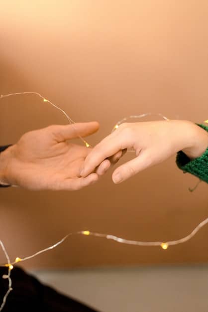 A close-up of two hands gently touching, symbolizing connection and compassion. Soft, warm lighting enhances the feeling of care and understanding.
