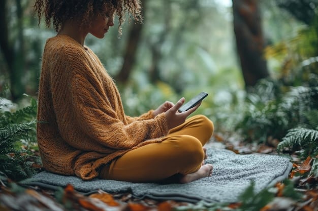A person using a meditation app on their smartphone in a quiet, nature-filled setting, illustrating the use of technology to aid meditation practice.