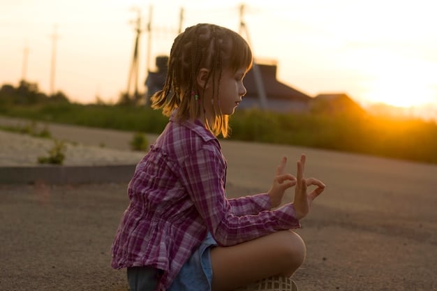 A person sitting in a lotus position, meditating outdoors at sunrise. The warm light illuminates their face, reflecting a sense of inner peace and tranquility. The background includes a natural landscape with mountains and trees, symbolizing harmony and connection with nature.