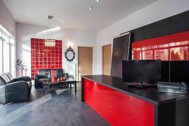 A modern living room with bold red accents, a minimalist design, and an open layout, capturing the energetic and vibrant spirit of Aries.