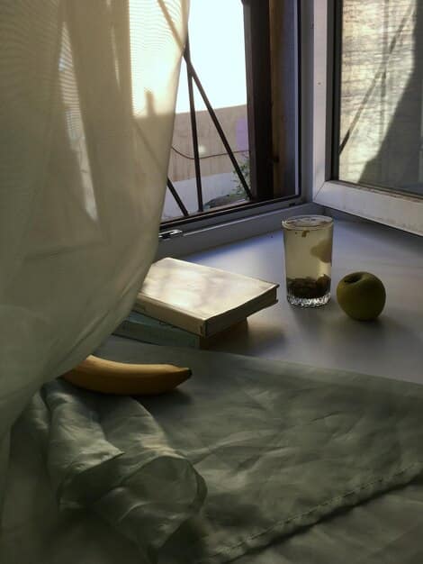 A sunlit corner of a bedroom transformed into a meditation space, featuring a comfortable cushion, a small bookshelf with spiritual books, and a plant. The walls are painted in a calming pastel color, enhancing the peaceful ambiance.