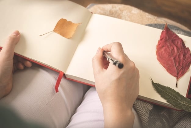 A close-up shot of a hand writing in a gratitude journal. The journal is open on a wooden surface, with a pen resting on the page. The background is slightly blurred, showing a cozy and inviting setting with soft lighting.