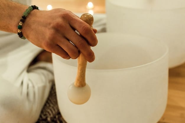 Close-up of a sound therapist playing a crystal singing bowl, with soft light reflecting off the bowl's surface. Emphasis on the hands gently striking the bowl and the emanating sound waves.