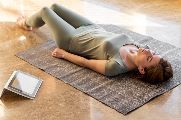 A person lying down on a yoga mat in a dimly lit room, eyes closed, hands resting on their stomach, a blanket covering them, completely relaxed and immersed in guided imagery meditation.
