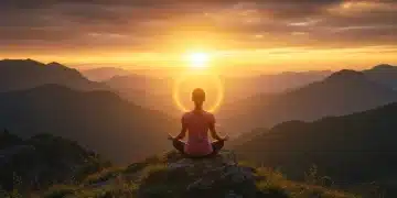 Woman meditating on mountain peak at sunrise, embodying spiritual awakening.